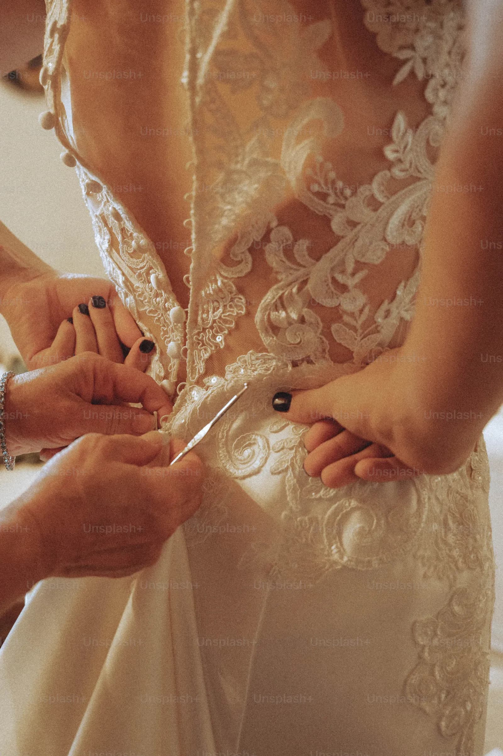 Bridal makeup artist preparing a bride before the ceremony